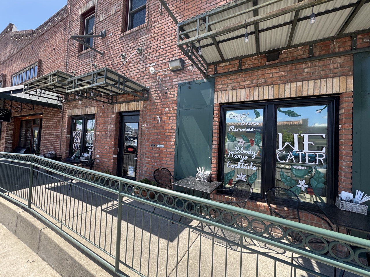 Rebel Hen Cafe coffee and breakfast spread inside the historic Lincoln Brand Feeds building in Old Town Lincoln, California